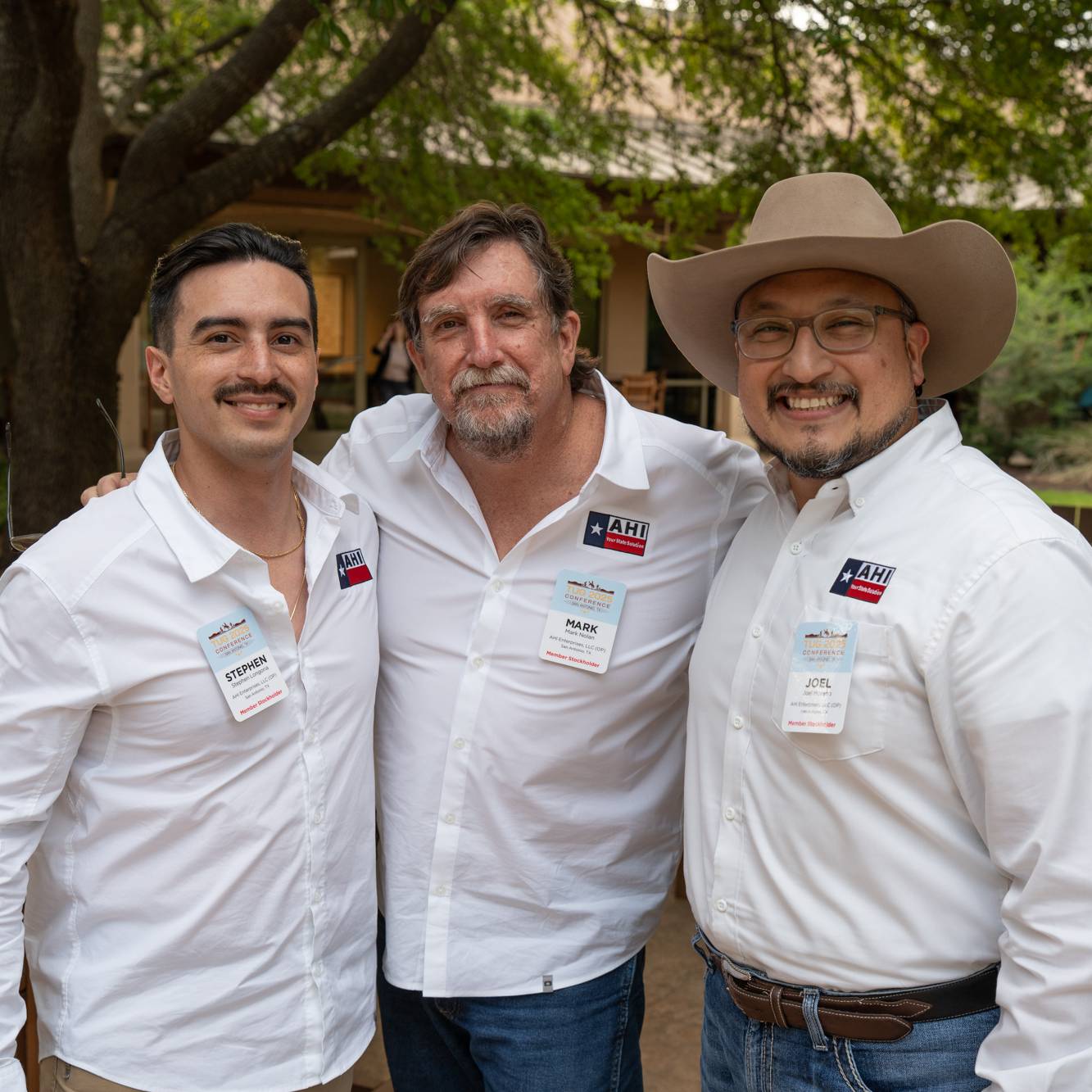 group of 3 posing for a photo