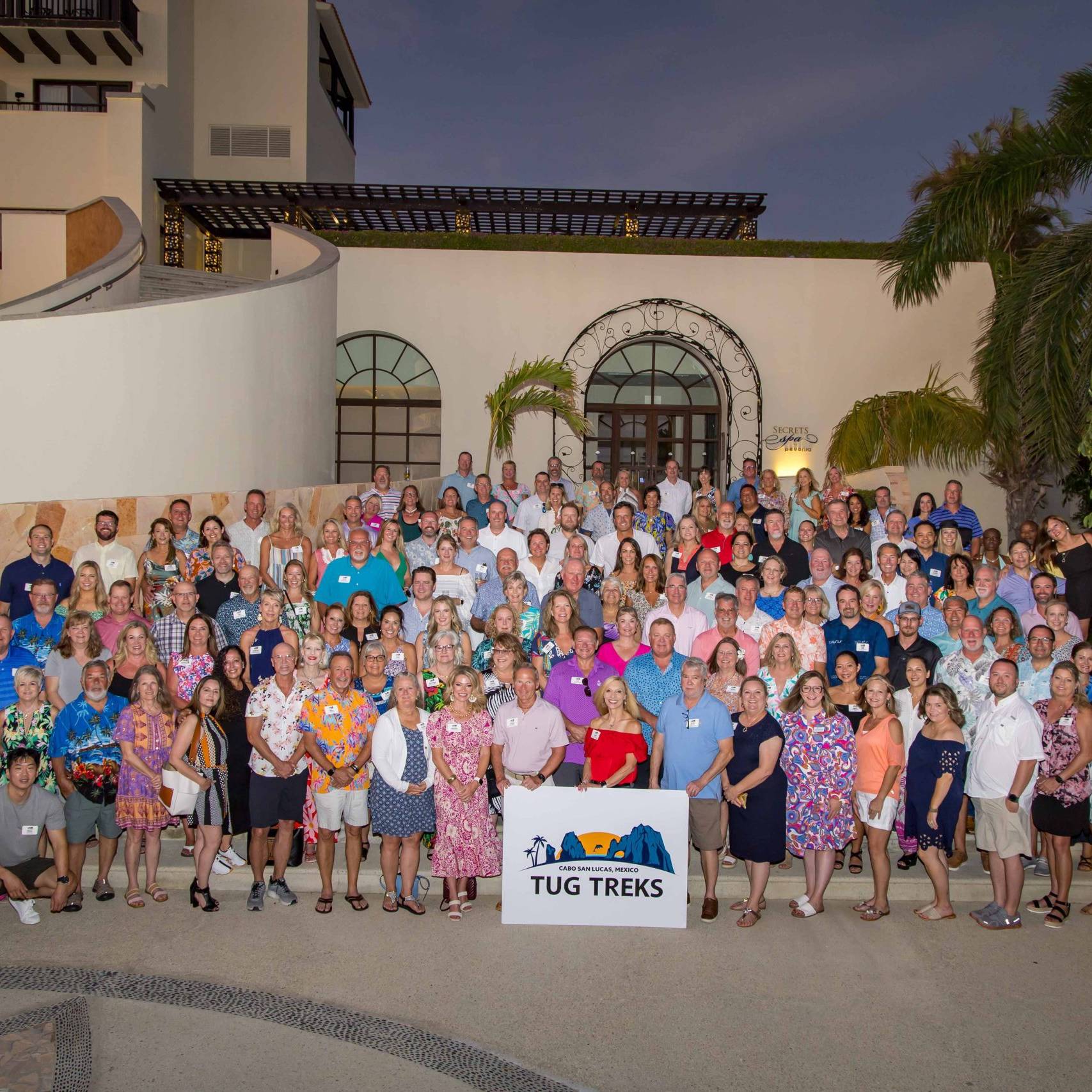 large group photo on an outdoor staircase